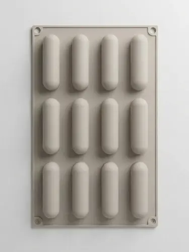 Thick silicone baking mold with elongated cavities for eclairs and syrniki, Model KS84
